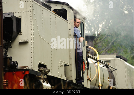 The driver of the steam train on the welsh highland railway, Beddgelert, Gwynedd north wales UK Stock Photo