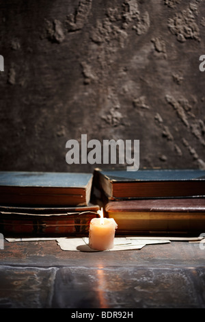 Old Books & Candle Stock Photo