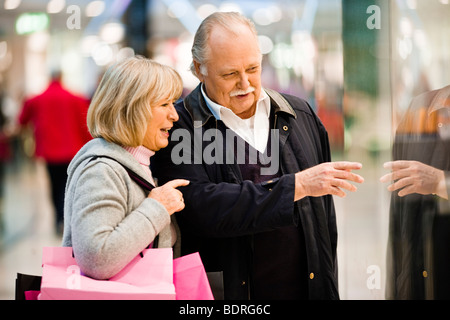 A senior couple window-shopping Stock Photo