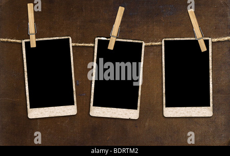 Three Antique Film Blanks Hanging on a Rope With Clothespins Stock Photo