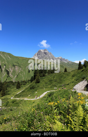 Hikers on Hochtannbergpass, Lechtal Alps, Vorarlberg, Austria, Europe Stock Photo