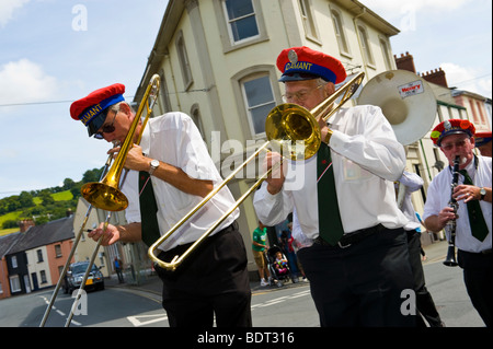 Adamant Marching Jazz Band parade through the streets during Brecon Jazz Festival UK Stock Photo