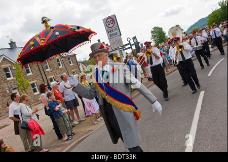 Adamant Marching Jazz Band parade through the streets during Brecon Jazz Festival UK Stock Photo