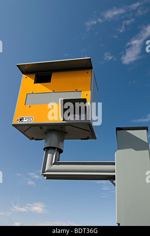a British speed camera known as a gatso on the side of a road on a ...