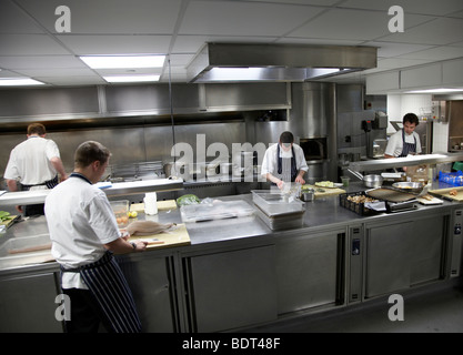 chefs working in a professional restaurant Stock Photo