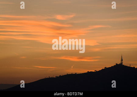 A telecommunications tower on top of a hill in Barcelona, Spain. Stock Photo