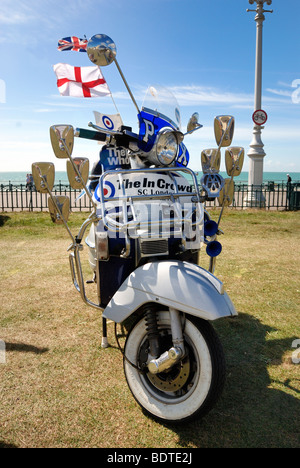 Mods moped parked on seafront Stock Photo