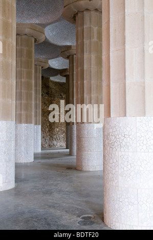 Columns supporting the seating area of Park Guell, designed by Antoni Gaudi, in Barcelona, Spain. Stock Photo