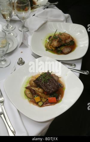 Steak and chicken served at a wedding held at the Inn of the Seventh Ray, a restaurant in Topanga, Los Angeles County, California. United States of America Stock Photo