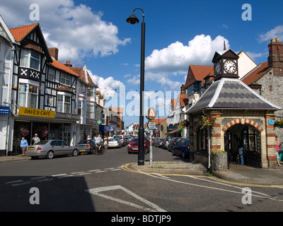 High street with historic town clock built 1862 and prominent CCTV mast in Sheringham North Norfolk Stock Photo