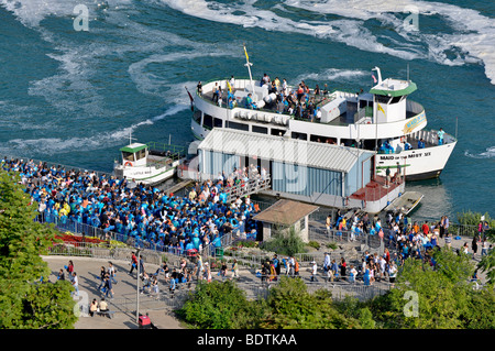 Maid of the Mist boat with tourists, Niagara Falls, Canada Stock Photo