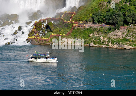 Maid of the Mist boat with tourists, Niagara Falls, Canada Stock Photo