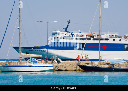 Ionian Star ferry docked in the small harbour at Poros on the Greek Mediterranean island of Kefalonia Greece GR Stock Photo