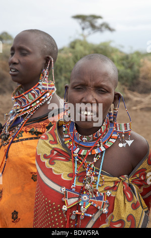 KENYA Masai women getting ready to dance at their Masai village within the Amboseli National Park. Photo by Sean Sprague 2007 Stock Photo