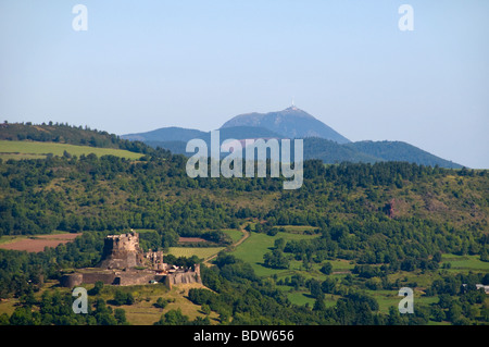 Auvergne landscape with Murol castle and  puy de Dôme  mountain Stock Photo