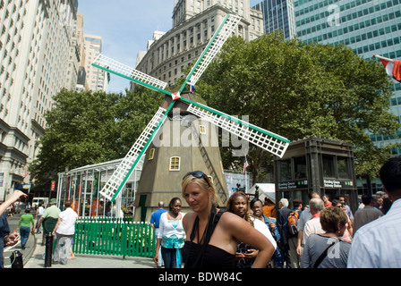 A windmill forms the centerpiece of the New Amsterdam Village in Bowling Green Park as part of the NY400 exhibit in New York Stock Photo