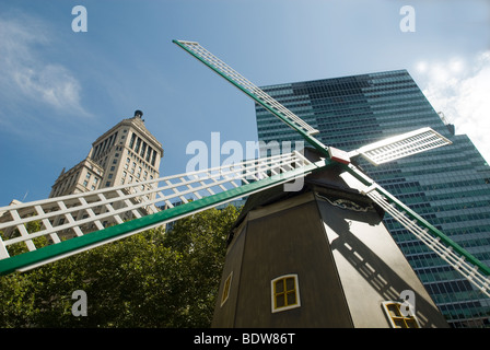 A windmill forms the centerpiece of the New Amsterdam Village in Bowling Green Park as part of the NY400 exhibit in New York Stock Photo