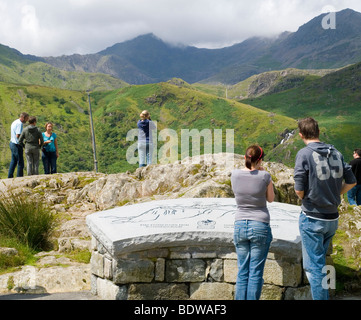 People looking out at Snowdon from a parking area above Nant Gwynant, Gwynedd Snowdonia North Wales UK Stock Photo