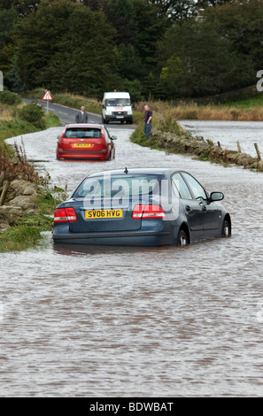 Cars abandoned after being caught in flood water on roads near Aberdeen, Scotland, UK, after heavy rain Stock Photo