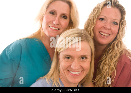 nurse nurses three group team lady ladies females teamwork pretty lab talk talking confer conferring discussion discuss coats o. Stock Photo