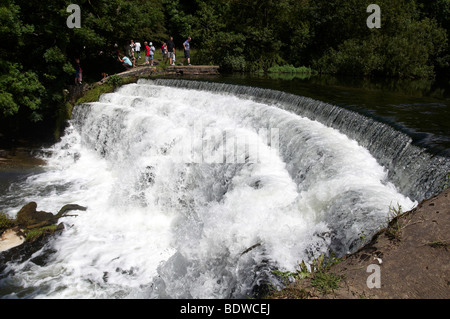 The weir across the River Wye in Monsal Dale, Derbyshire Peak District, England Stock Photo