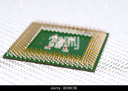 Computer CPU chip on binary code Stock Photo