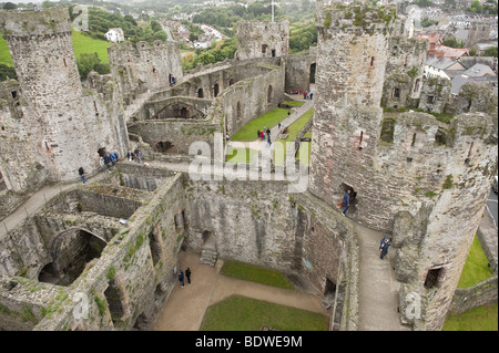 Aerial view tourists visiting Conwy Castle in Gwynedd, North Wales built by King Edward I in 1283 Stock Photo
