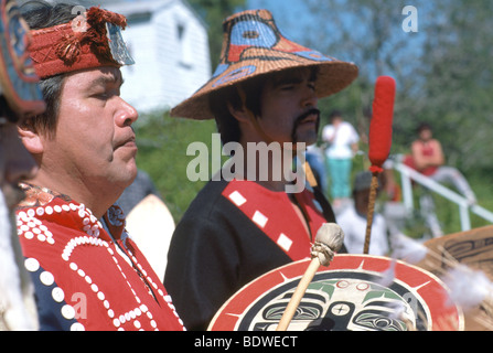 Native American Indians in Traditional Ceremonial Regalia celebrating at a Pow Wow in Bella Bella British Columbia Canada Stock Photo