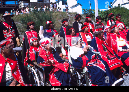 Native American Indians in Traditional Ceremonial Regalia celebrating at a Pow Wow in Bella Bella British Columbia Canada Stock Photo