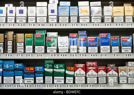 Cigarettes on display at tobacconists, England, UK Stock Photo