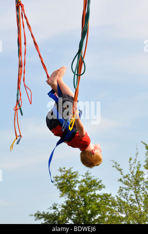 Boy enjoying European bungee Stock Photo