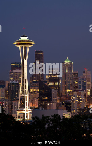 Retro image of Space Needle and downtown Seattle at night and city lights, Washington State Stock Photo