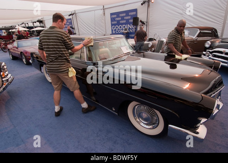 Employees Cleaning a 1957 Continental Mark II  before the Gooding & Company auction in Pebble Beach, CA. Stock Photo