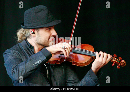 Star violinist David Garrett in an open-air performance at the movie nights at the bank of the river Elbe in Dresden, Saxony, G Stock Photo