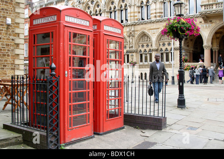 Red phone boxes outside the Guildhall , Northampton , England , UK Stock Photo