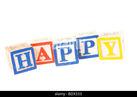 Wooden building Blocks spelling happy Stock Photo