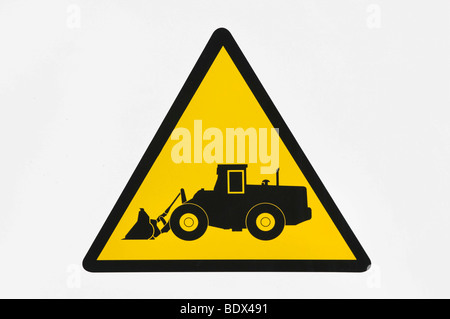 Warning sign, beware of construction vehicles Stock Photo