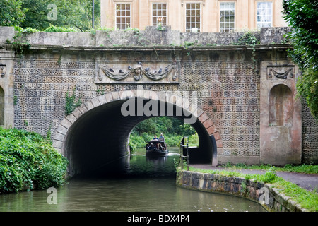 A narrow boat about to enter a tunnel on the Kennet and Avon Canal in Bath, Somerset, UK Stock Photo