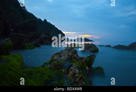 Hele Bay landscape photography at tide out on a June summers evening Stock Photo