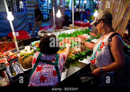 Outdoor fresh BBQ food stall in Namdemun Market in Seoul South Korea Stock Photo