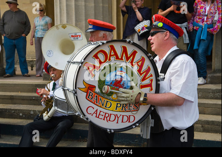 Adamant Marching Jazz Band parade through the streets during Brecon Jazz Festival UK Stock Photo