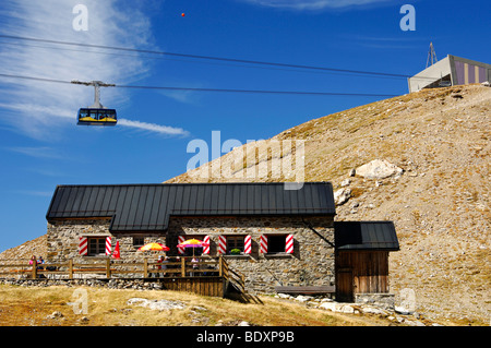 Mountain hut Cabane des Diablerets of the Swiss Alpine Club beneath the middle station of the cable car Col du Pillon - Scex Ro Stock Photo