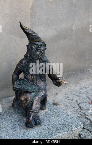 Wroclaws' dwarf. One of a dozens small, funny sculptures hidden in the whole city. Stock Photo