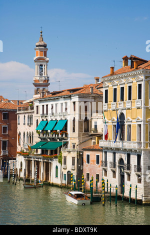 The spire of Bell Tower of Santi Apostoli Church and Canal Grande from Ponte di Rialto, Rialto Bridge, Venice, Italy, Europe Stock Photo