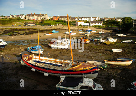 Cemaes village and harbour at low tide Anglesey, Ynys Mon, North Wales, UK Stock Photo