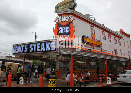 Hungry customers wait in line at Genos Steaks, home of famous cheesesteaks in Philadelphia, Pennsylvania.  Katharine Andriotis Stock Photo