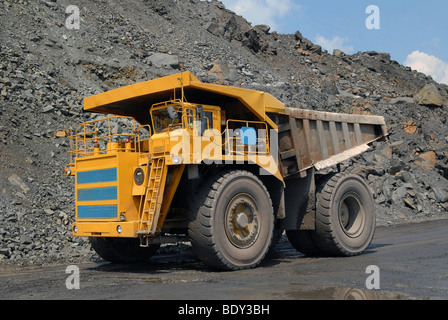 The big trucks transport iron ore in career Stock Photo