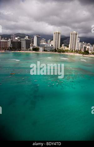 Aerial view of surfers at Waikiki Beach in Honolulu, Hawaii Stock Photo