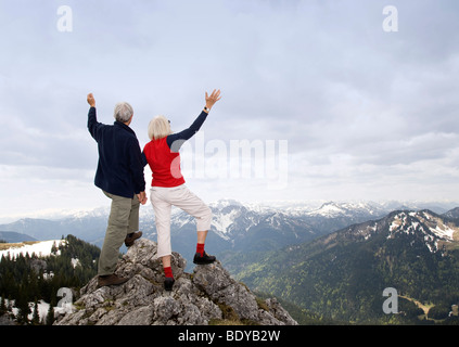 senior couple on mountain summit Stock Photo