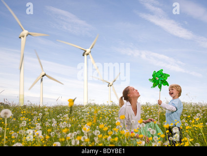 mother and son at wind turbine Stock Photo